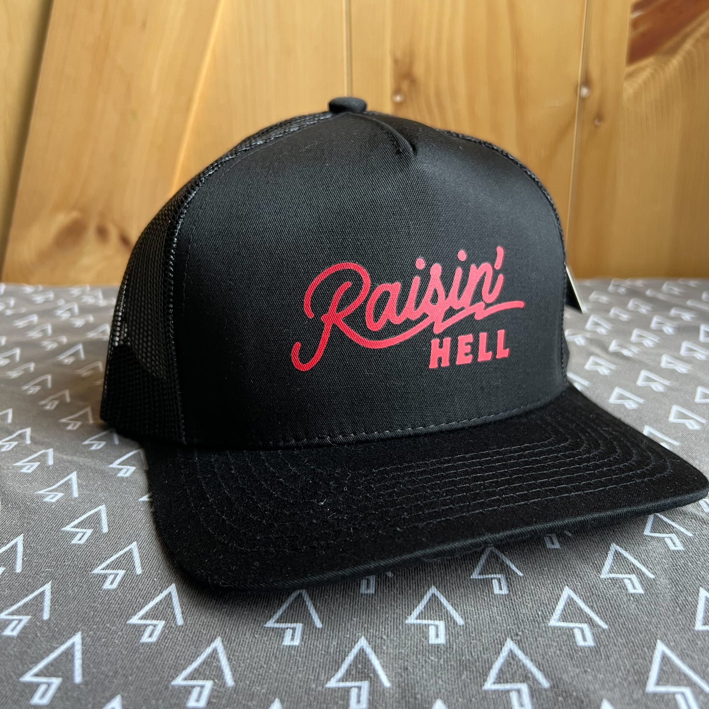 Raising Hell Trucker Hat